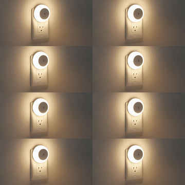 Warm LED plug-in night light set with dusk-to-dawn sensor