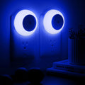 Warm LED plug-in night light set with dusk-to-dawn sensor