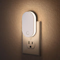 Plug-in night light two-pack with dimmable RGB or warm-white lighting